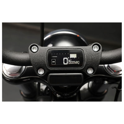 The Koso D2 Heads-Up Display for Harley '11-'17 FX, '11-'23 FL, and '15-'22 XL models showcases a digital vehicle dashboard with a top speed of 299 km/h, featuring a tachometer and multiple indicators in both the upper and lower sections. This plug-and-play multifunction meter is designed for compatibility with Harley models.