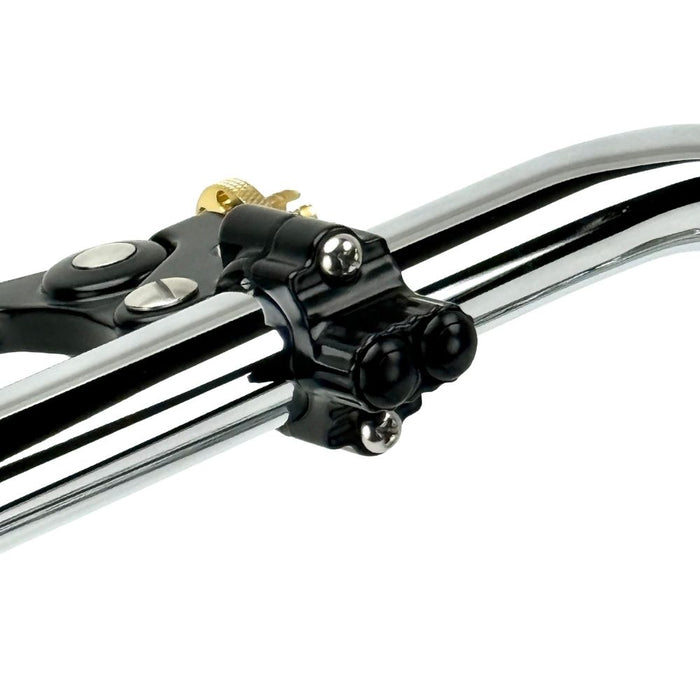 Four Moto Iron® Brake/Clutch Mounted Switches and black handlebar switch housings are arranged diagonally on a white background.