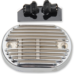 The Drag Specialties Voltage Regulator Cover for 2011-2016 Harley-Davidson Softail is an oval, metallic, vented plate with horizontal ridges and two side screw holes, designed to fit Drag Specialties voltage regulators.