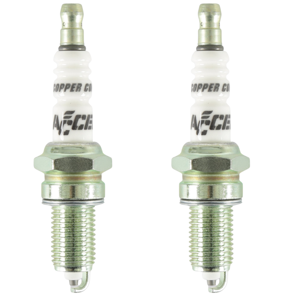 Four identical Accel Spark Plugs for Harley-Davidson Twin Cam and Sportster Evolution, by Accel, are arranged against a white background in two vertical columns and two rows, each positioned at varying angles.