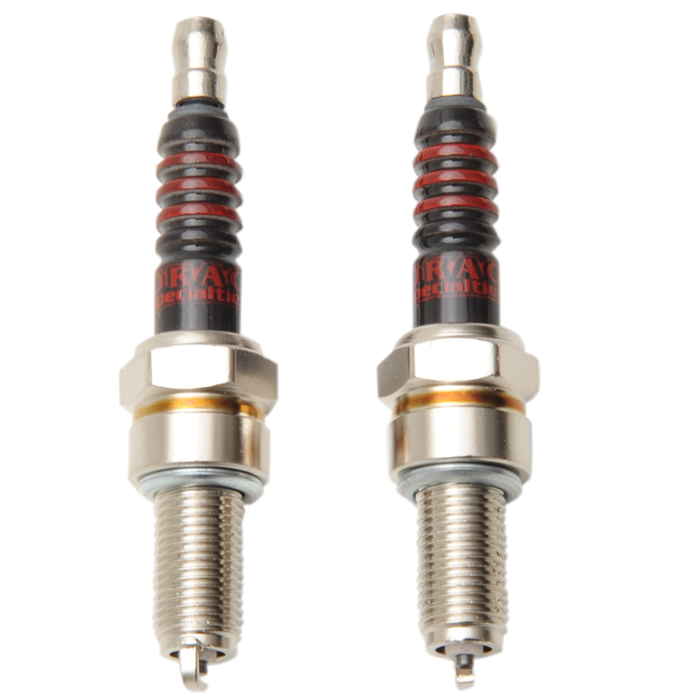 Two Drag Specialties Spark Plugs for Harley-Davidson M-8 and XG with gold-tone threaded bases and black ribbed upper sections with red bands.