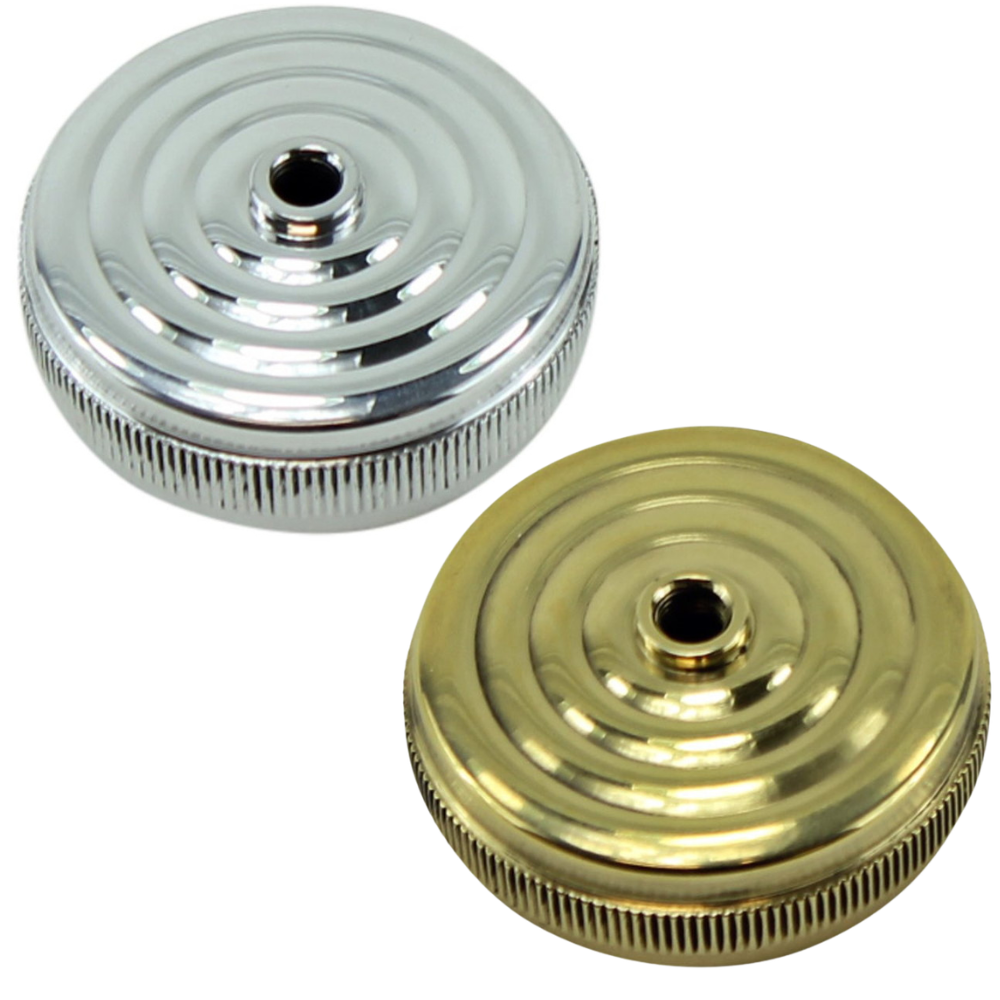 Two round, ridged metal LC Fabrications Decorative Tops for Mikuni Carburetors—one silver, one gold—shown on a white background.