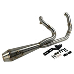 The SP Concepts Lane Splitter Exhaust for M8 Softail w/o Factory Bags—Stainless, features a 2-into-1 design, visible welds, and brand logo emblem, displayed on a workshop surface.