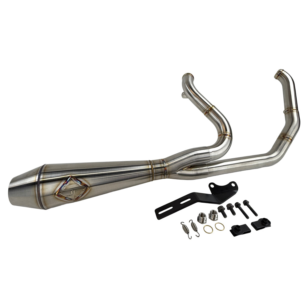 The SP Concepts Big Bore Exhaust M8 Softail 2018-Present - Stainless features polished stainless steel with visible welds and an engraved logo, designed for Monoshock Softail models, and is displayed on a gray work surface.