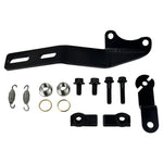 The SP Concepts Big Bore Exhaust for M8 Softail ST & Sport Glide (2018-Present) in stainless steel, featuring welded joints and a hexagonal logo emblem, rests on a metallic work surface, highlighting its premium finish.