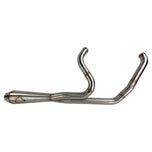 The SP Concepts Lane Splitter Exhaust for Harley Touring 2017-2025 – Stainless, with visible welds, sits on a workbench beside an American flag welding helmet—ready to upgrade your ride in style.
