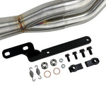 An SP Concepts Lane Splitter Exhaust Sportster 2014-2022 (stainless) motorcycle is parked in a garage.