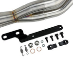 An SP Concepts Lane Splitter Exhaust Sportster 2014-2022 (stainless) motorcycle is parked in a garage.