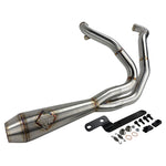 An SP Concepts Lane Splitter Exhaust Sportster 2014-2022 (stainless) motorcycle is parked in a garage.
