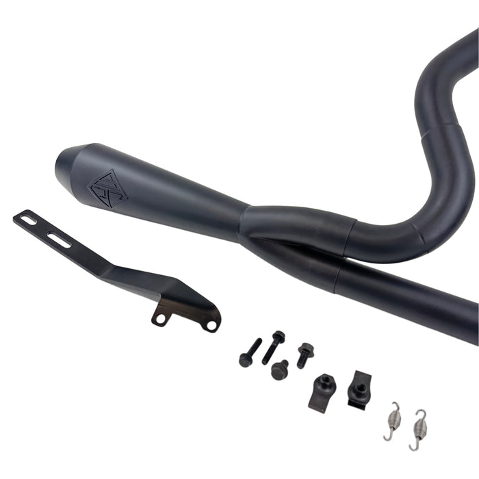 A SP Concepts Lane Splitter Exhaust Dyna 1999-2005 (Black) is sitting on a table.