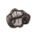 A Arlen Ness makeup bag on a white surface.