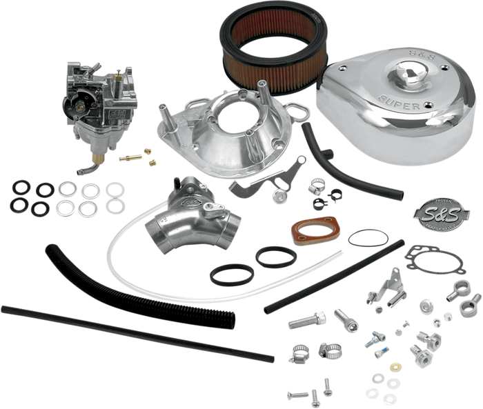 An S&S Cycle Super E Carburetor Kit for 1993-1999 Harley-Davidson Big Twin is displayed, showing a carburetor, teardrop air cleaner, gaskets, hoses, clamps, screws, and assorted small metal parts.