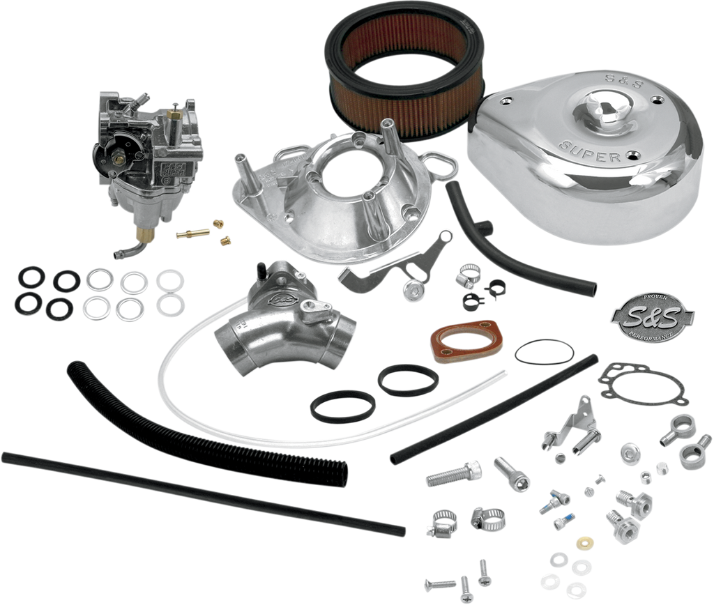 An S&S Cycle Super E Carburetor Kit for 1993-1999 Harley-Davidson Big Twin is displayed, showing a carburetor, teardrop air cleaner, gaskets, hoses, clamps, screws, and assorted small metal parts.