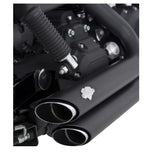 A silver motorcycle with a Vance & Hines Short Shots Exhaust System 06-09 Fat bob, Dyna, Low, Wide & Super Glide - Black on a white background.