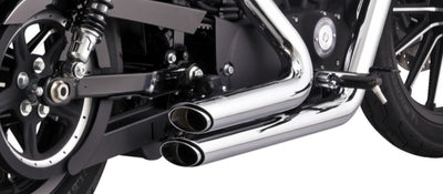 A close up of a motorcycle with Vance & Hines Shortshots Staggered Exhaust System 2014-2021 Sportster - Chrome exhaust pipes from the exhaust system.