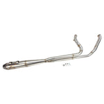 A close up of a SP Concepts M8 Bagger stainless full-length exhaust pipe.