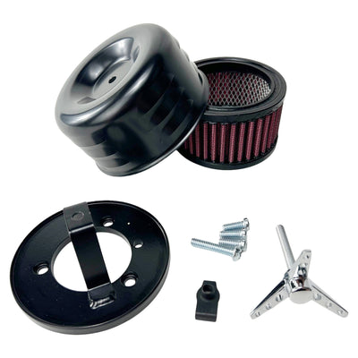 The TC Bros. Black Louvered Air Cleaner for Bendix Zenith & Keihin Butterfly Carbs is displayed with its various components, including housing, a washable cotton gauze filter element, screws, and a mounting bracket, all arranged neatly on a white background.