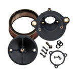 Close-up of a black circular mechanical component with a central screw and four spokes, two metal mounting brackets, and a red ribbed filter around its perimeter, resembling the Stealth Air Cleaner Kit - Black Cover - For 23 CVO Road Glide & 24+ Touring often seen on Road Glide models by S&S Cycle.