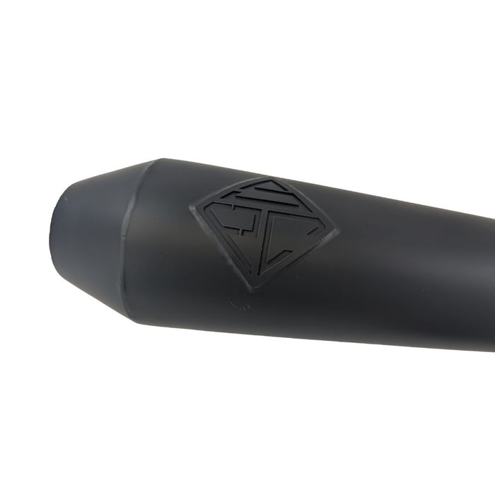 An SP Concepts Lanesplitter Exhaust, featuring their sleek logo, lies on the concrete alongside stainless steel headers, perfectly tailored for a black Harley Davidson Sportster (1986-2003), transforming it into an exhilarating ride.