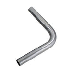 TC Bros. Mandrel Bent Elbows for Custom Exhaust—set of four metal pipes, each bent at different angles, perfect for Harley-Davidson exhaust upgrades or custom projects.