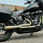 TC Bros. 2-into-1 Stainless Exhaust System for 2018-Up Harley-Davidson Softail: A stainless steel 2-into-1 exhaust system by TC Bros., engineered for Milwaukee-Eight Harley-Davidson Softail motorcycles, shown on a white background with black product text below.
