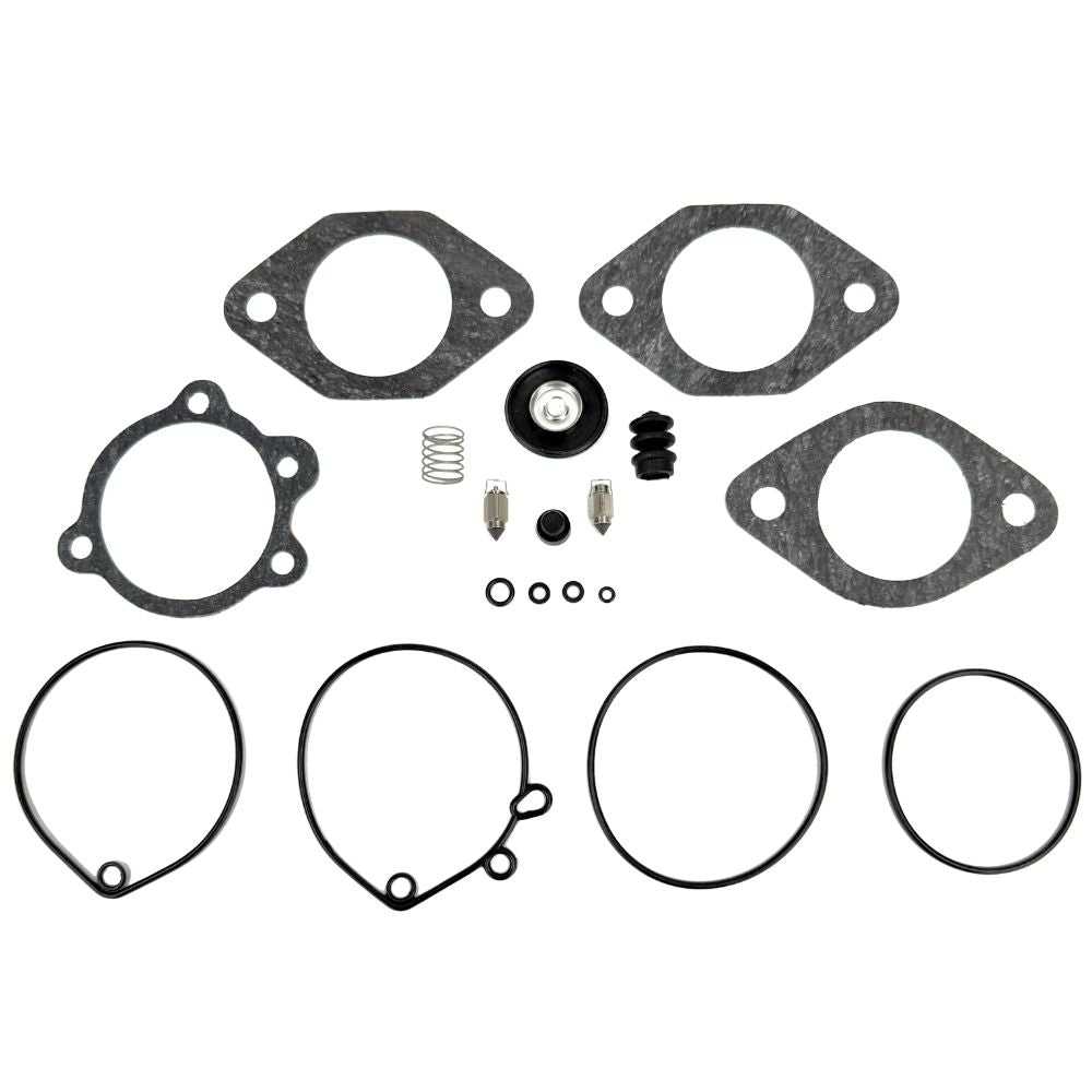 A selection of carburetor rebuild components—including gaskets, O-rings, springs, needle valves, and a diaphragm—neatly arranged on a white background; this set is the Wyatt Gatling Master Rebuild Kit for Keihin Butterfly Carburetor by Wyatt Gatling.