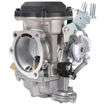 Two Moto Iron® CV Carburetors for Harley-Davidson are shown; one features a silver finish with visible springs and levers, evoking the style of classic Harley carburetors, while the other is black and equipped with sensors and attached cables. Both display intake and fuel control mechanisms.