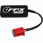 Two smartphones displaying motorcycle performance data and a map, positioned behind a Vance and Hines FPX Trak & Tune Tuner for 2007-2013 Harley-Davidson—Red 4-pin J1850 Bus Data Port Connector.