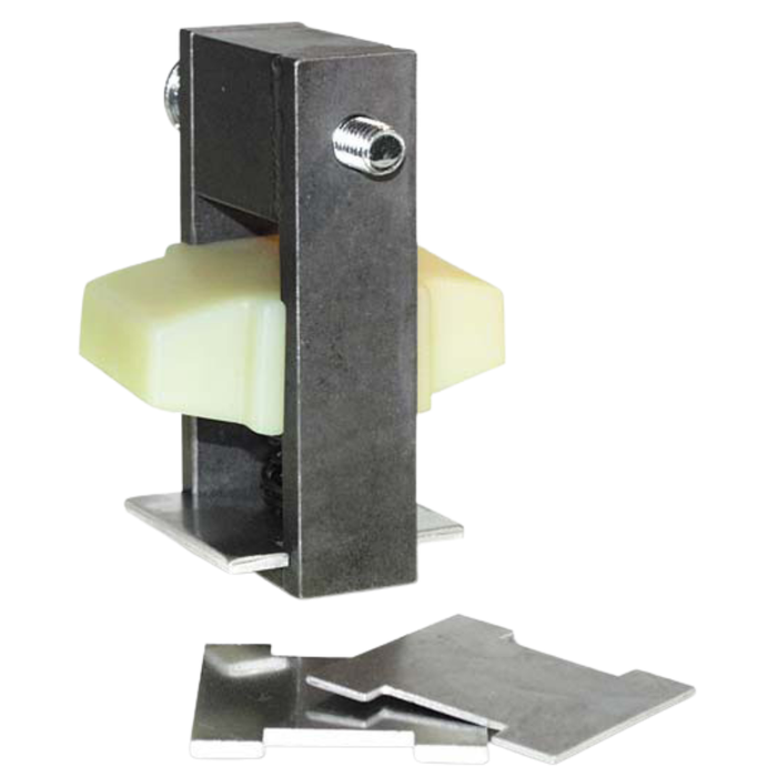 The Hayden Enterprises M6 Self-Adjusting Primary Chain Tensioner for 2001-2006 Harley-Davidson Big Twin is a metal and plastic clamp device with a spring mechanism, shown upright with an extra flat metal component beneath it.