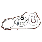 The Moto Iron® Complete Primary Gasket Kit for Harley-Davidson Dyna and Softail includes gaskets, seals, washers, and hardware, all neatly arranged on a white background.
