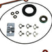 The Moto Iron® Complete Primary Gasket Kit for Harley-Davidson Dyna and Softail includes gaskets, seals, washers, and hardware, all neatly arranged on a white background.