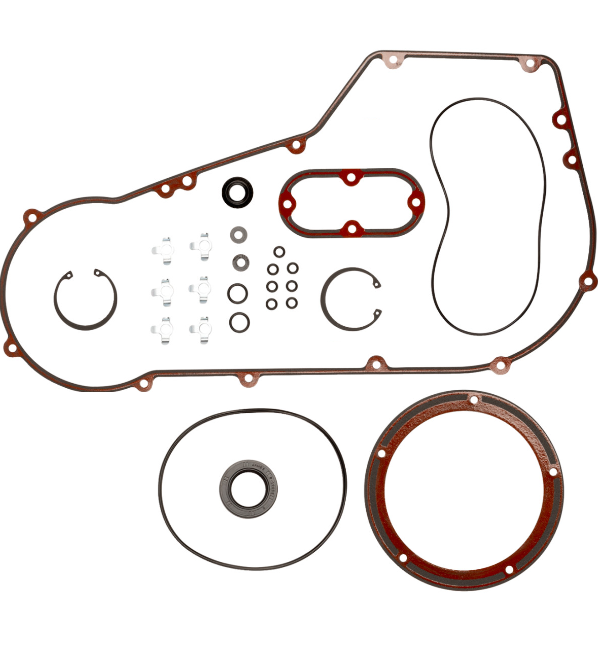 Moto Iron Complete Primary Gasket Kit for Harley-Davidson Dyna and Softail by Moto Iron, shown on a white background with included gaskets, seals, o-rings, and hardware.