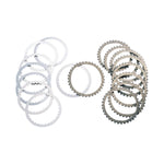 Three sets of circular metal and Kevlar clutch plates from the Barnett Clutch Kit for 1990-1997 Harley-Davidson Big Twin and 1991-2022 Sportster, in various colors and textures, are displayed on a white background.