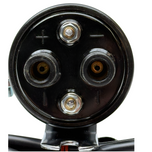 The Moto Iron® Big Twin High Performance Round Coil with Wires (fits 65-79) in black, featuring a metal bracket and red tie-bound connector cables, ensures optimal efficiency.