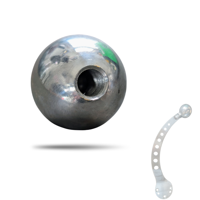 The Pangor Cycles Mini Shift Knob, a polished aluminum piece with a threaded hole, is shown next to a curved, perforated metal strip—both isolated on a white background.