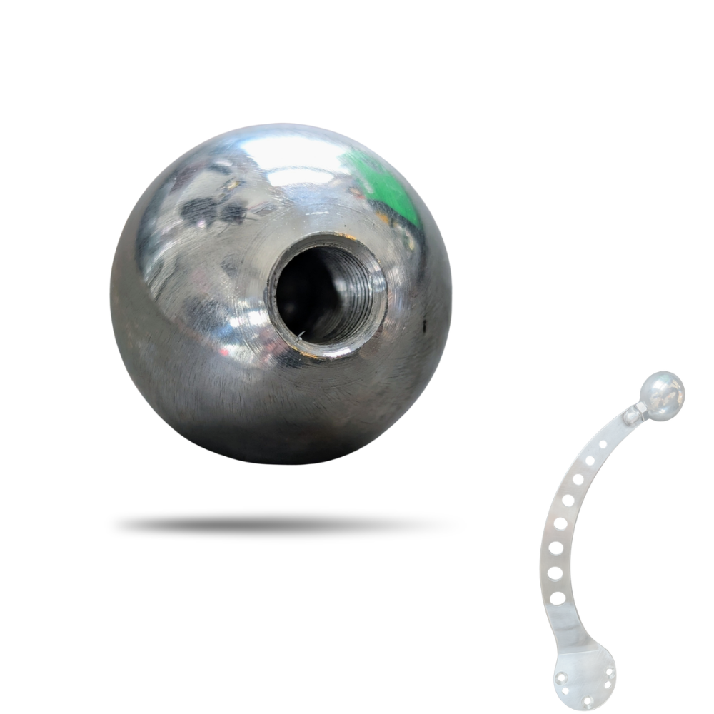 The Pangor Cycles Mini Shift Knob, a polished aluminum piece with a threaded hole, is shown next to a curved, perforated metal strip—both isolated on a white background.