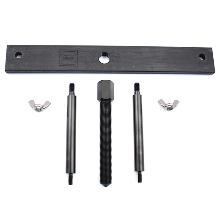 Wyatt Gatling Clutch Hub Spring Compressor for 1971-1984 Harley-Davidson Ironhead—black metal tool set with flat bar, central bolt, two rods, and wing nuts—by Wyatt Gatling, displayed on a white background.