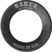 A Baker Drivetrain Comptimizer heavy duty metal washer, engraved with “BAKER” and “MADE IN USA,” is shown angled on a white background—designed specifically for use with 2011-up Harley Davidson Big Twin compensator spring assemblies.