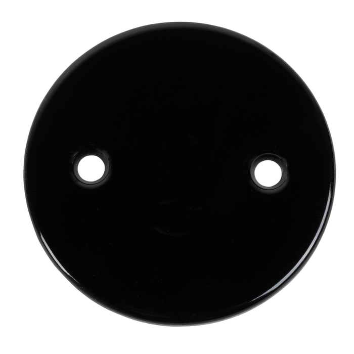 The Paughco Inspection Cover for 1936-1964 Harley-Davidson Big Twin by Paughco, available in both white and black finishes with two signature holes reminiscent of a classic tin-type design, is shown diagonally arranged on a white background.
