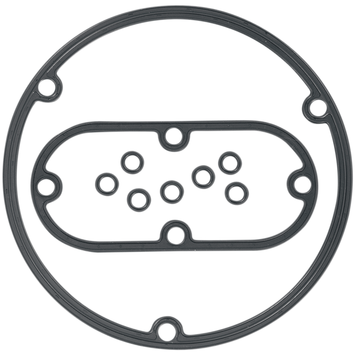 The James Primary Inspection and Derby Cover Gasket Kit 1970-1998 for Harley-Davidson Big Twin by James Gaskets features a black rubber derby cover gasket with a circular outer ring and an inner oval section containing multiple small circular openings, specifically designed for Harley-Davidson Big Twin models.