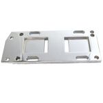 Rectangular chrome metal Wyatt Gatling Transmission Mounting Plate for 1936-1986 Harley-Davidson Big Twin with bolt holes and two central cutouts.