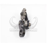 A black 1.25" Clamp On Chain Tensioner 530 Sprocket from Monster Craftsman on a white background.