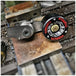 A Monster Craftsman machine tool with a Powell Peralta Weld On Chain Tensioner - Skate Wheel and belt drive on it.