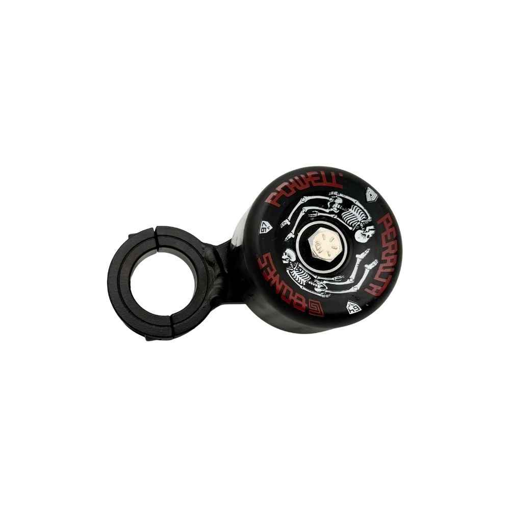 A Bolt On Chain Tensioner - Skate Wheel (Powell Peralta) with a drive chain and a handle on it.