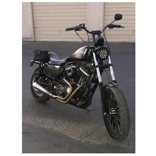 A black custom Invisivin Magnetic Vin Sticker Cover - 2011+ Sportster with dual split stickers 15" motorcycle parked on an asphalt surface outside a building during dusk.