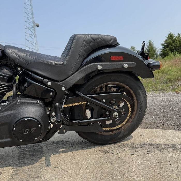 The TC Bros. Belt to Chain Drive Conversion Kit for 2018-Up Harley Davidson M8 Softail includes a large sprocket, small gear, hub, and hardware arranged on a white background—perfect for Milwaukee-Eight-powered models.