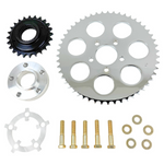 The TC Bros. Belt to Chain Drive Conversion Kit for 2018-Up Harley Davidson M8 Softail includes a large sprocket, small gear, hub, and hardware arranged on a white background—perfect for Milwaukee-Eight-powered models.