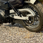 The TC Bros. Belt-to-Chain Drive Conversion Kit for 2000-2005 Harley-Davidson Dyna features 530 chain drive sprockets, bolts, washers, and mounting components displayed on a white background.