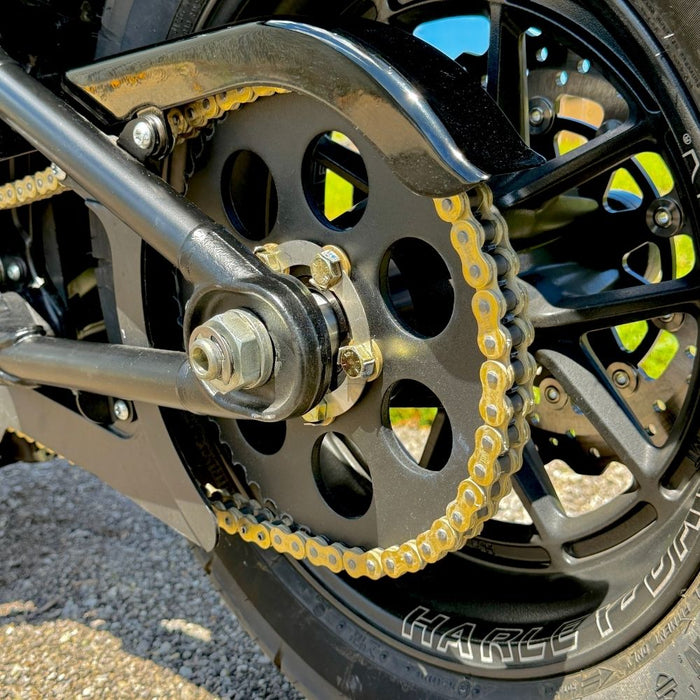 The TC Bros. Belt-to-Chain Drive Conversion Kit for 2018-Up Harley-Davidson Fat Bob includes two sprockets, gears, bolts, washers, and mounting hardware, all displayed on a white background.