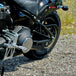 The TC Bros. Belt-to-Chain Drive Conversion Kit for 2018-Up Harley-Davidson Fat Bob includes two sprockets, gears, bolts, washers, and mounting hardware, all displayed on a white background.